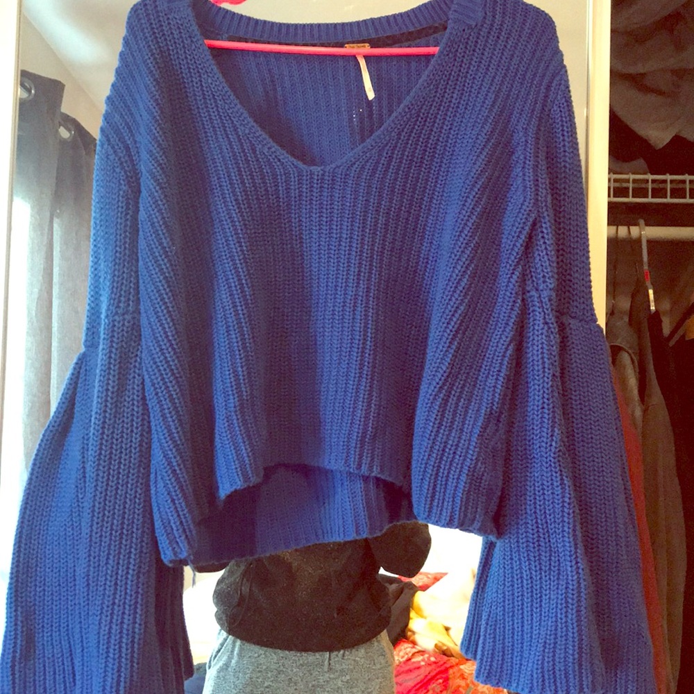 Vibrant blue 70s inspired sweater. Nearly new